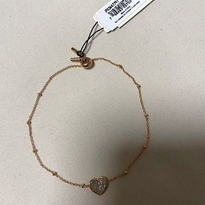 Fossil adjustable rose gold bracelet never worn with tags